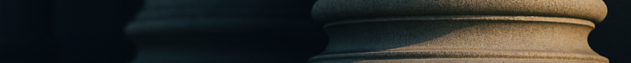 Courthouse columns symbolizing justice and due process.